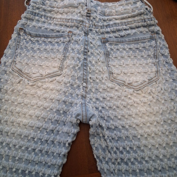 Aphrodite Sky Blue Ripped JeansThis is a pair of Venus Laser Etched Denim Shorts - Picture 4 of 6